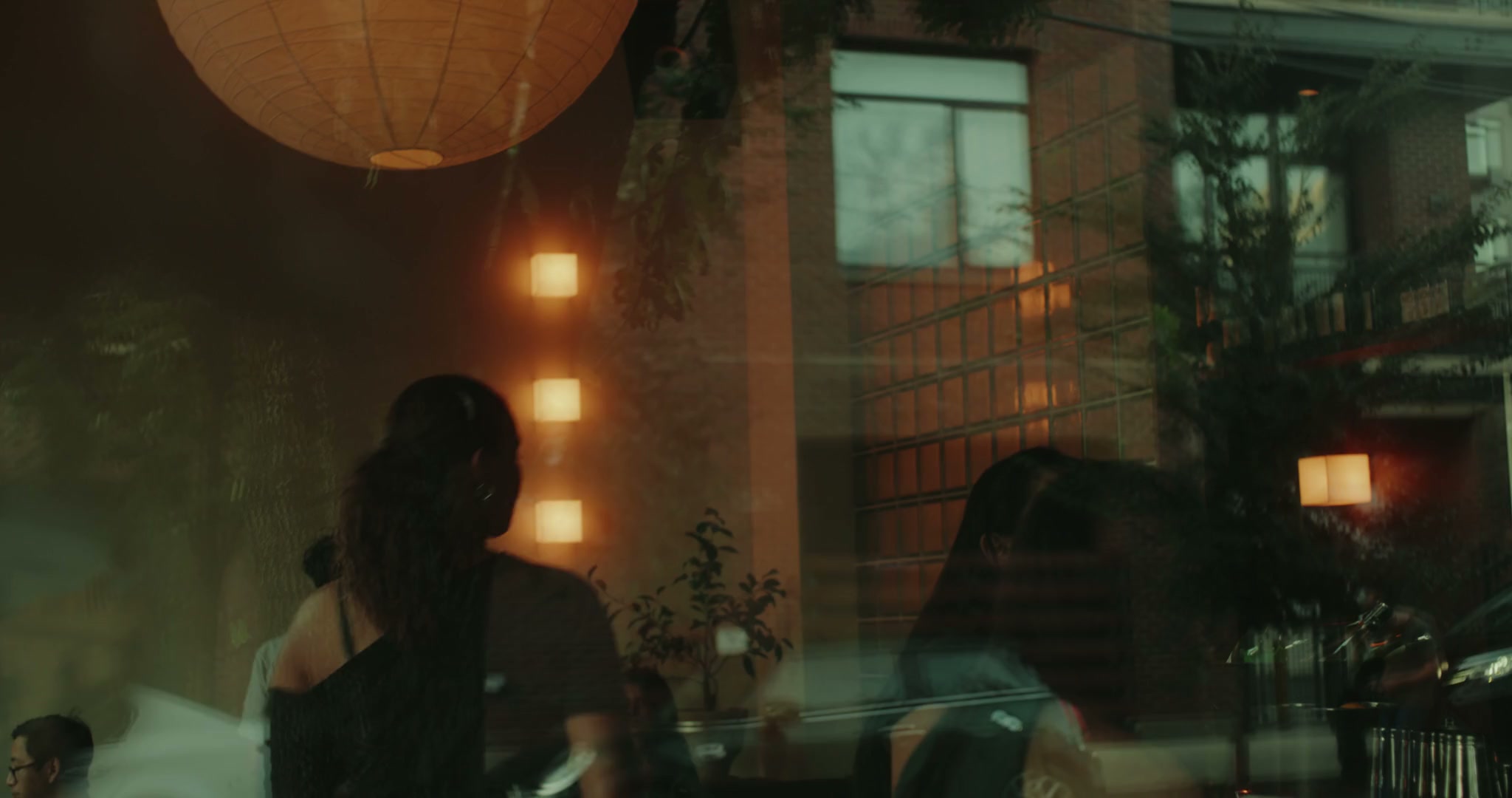Guests and service in Gloria’s warmly lit dining room